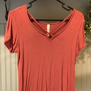 Maroon shirts with a cross cut